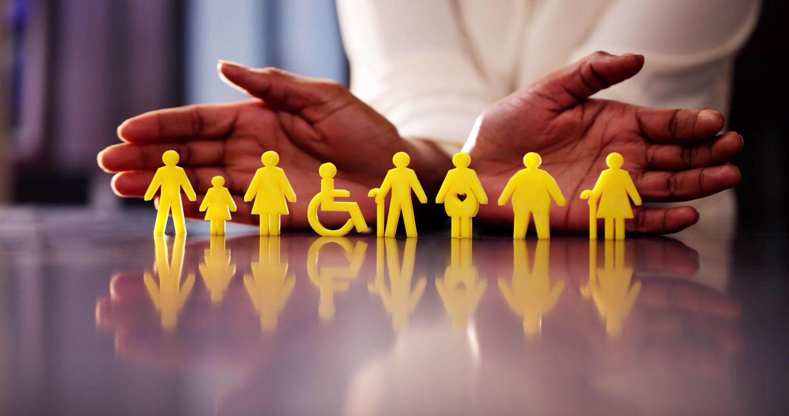 Summit image featuring human hands framing figures of a diverse set of people.